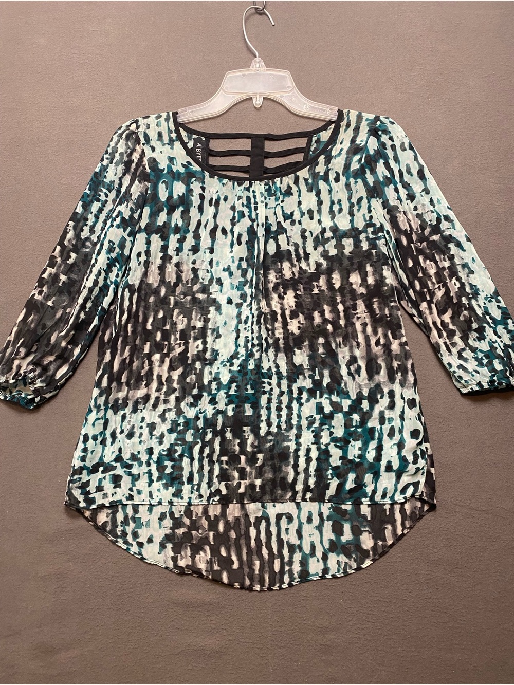 A. Byer Women’s Small Teal & Black Patterned Blouse with Ladder Back Detail
